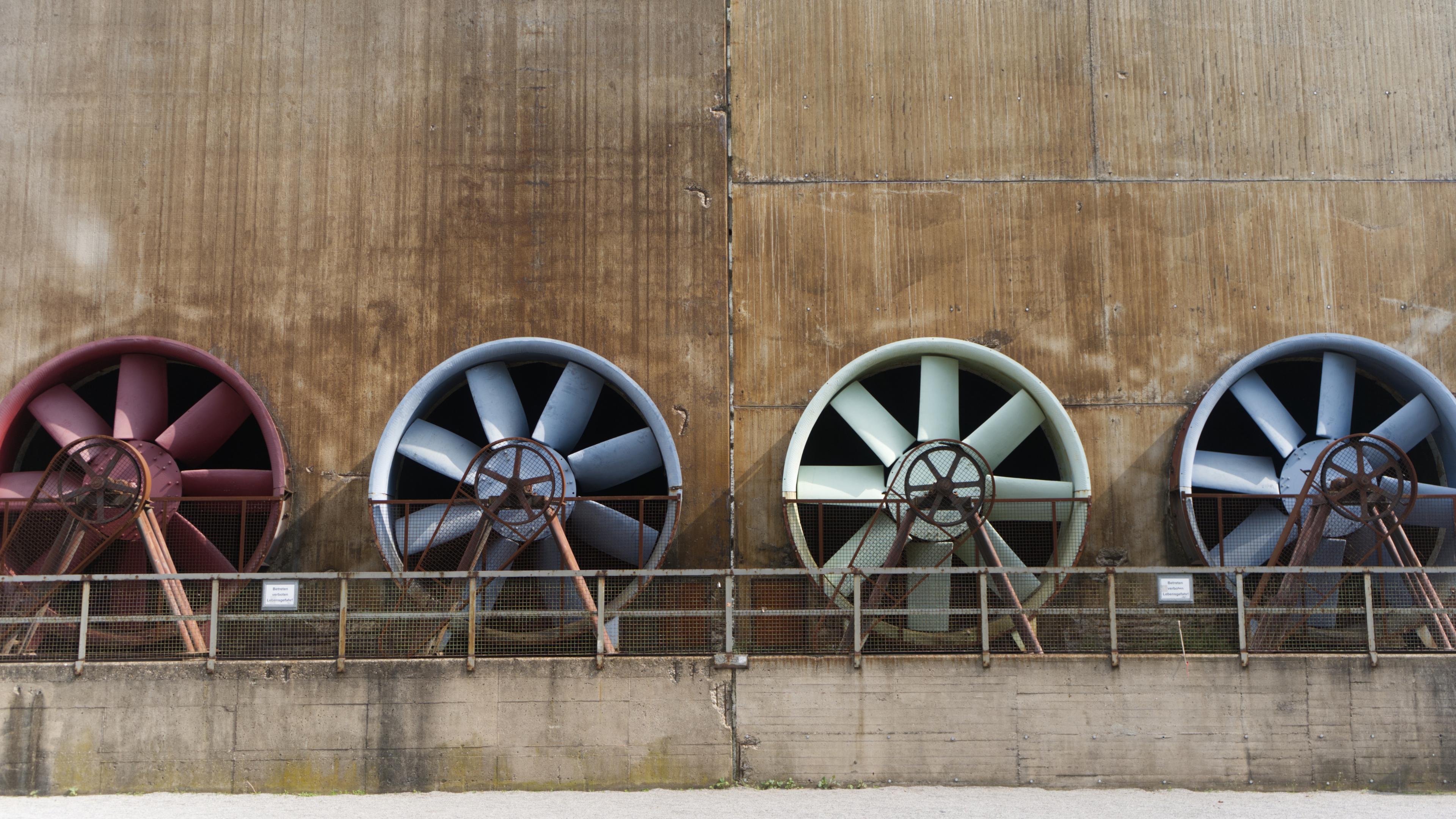 Industrial ventilation fans using Load Controls PMP-25 for motor load monitoring, equipment protection, and predictive maintenance.