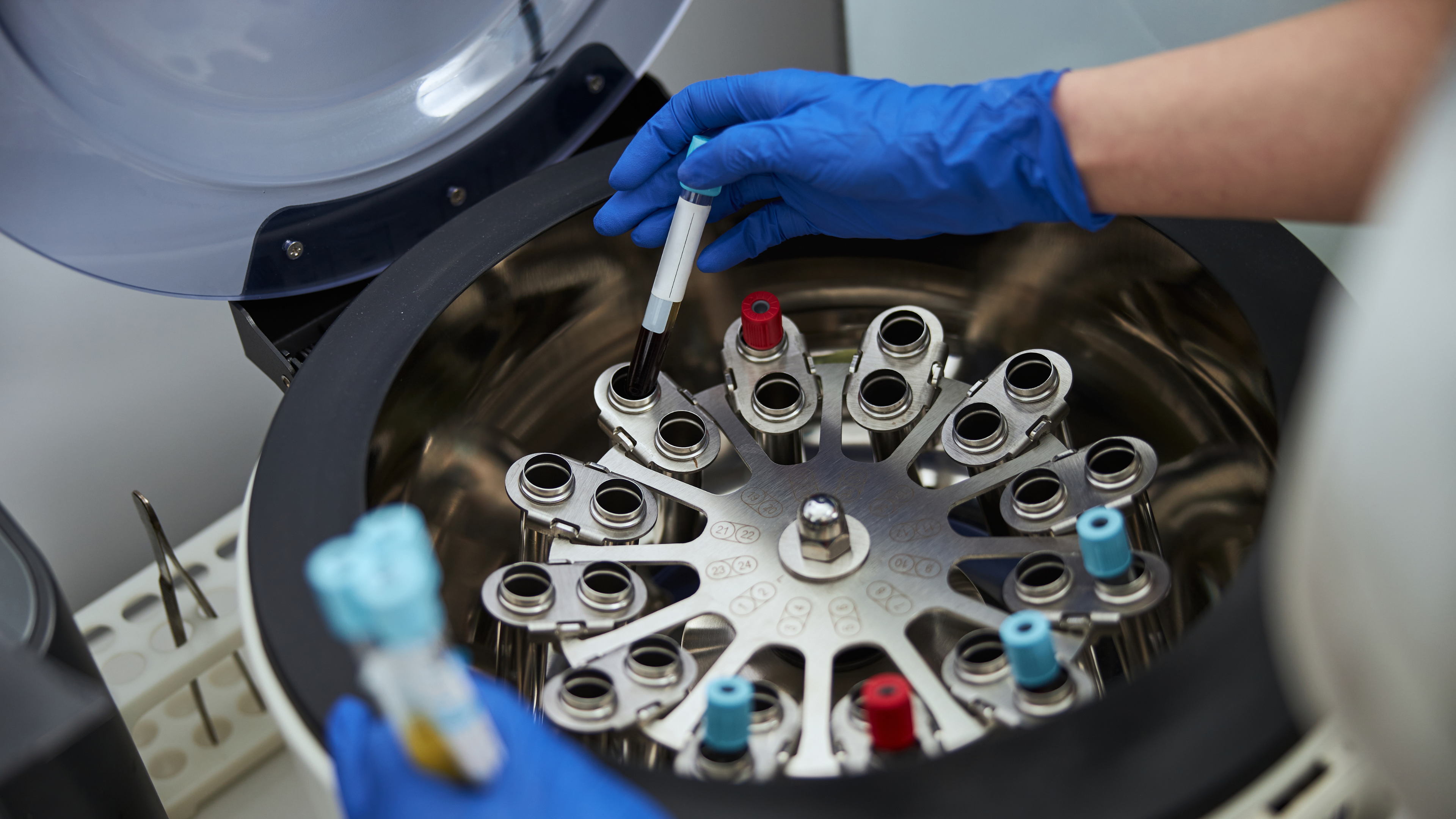 Laboratory centrifuge with Load Controls PMP-25 for clinical diagnostics, sample processing, and motor load monitoring.